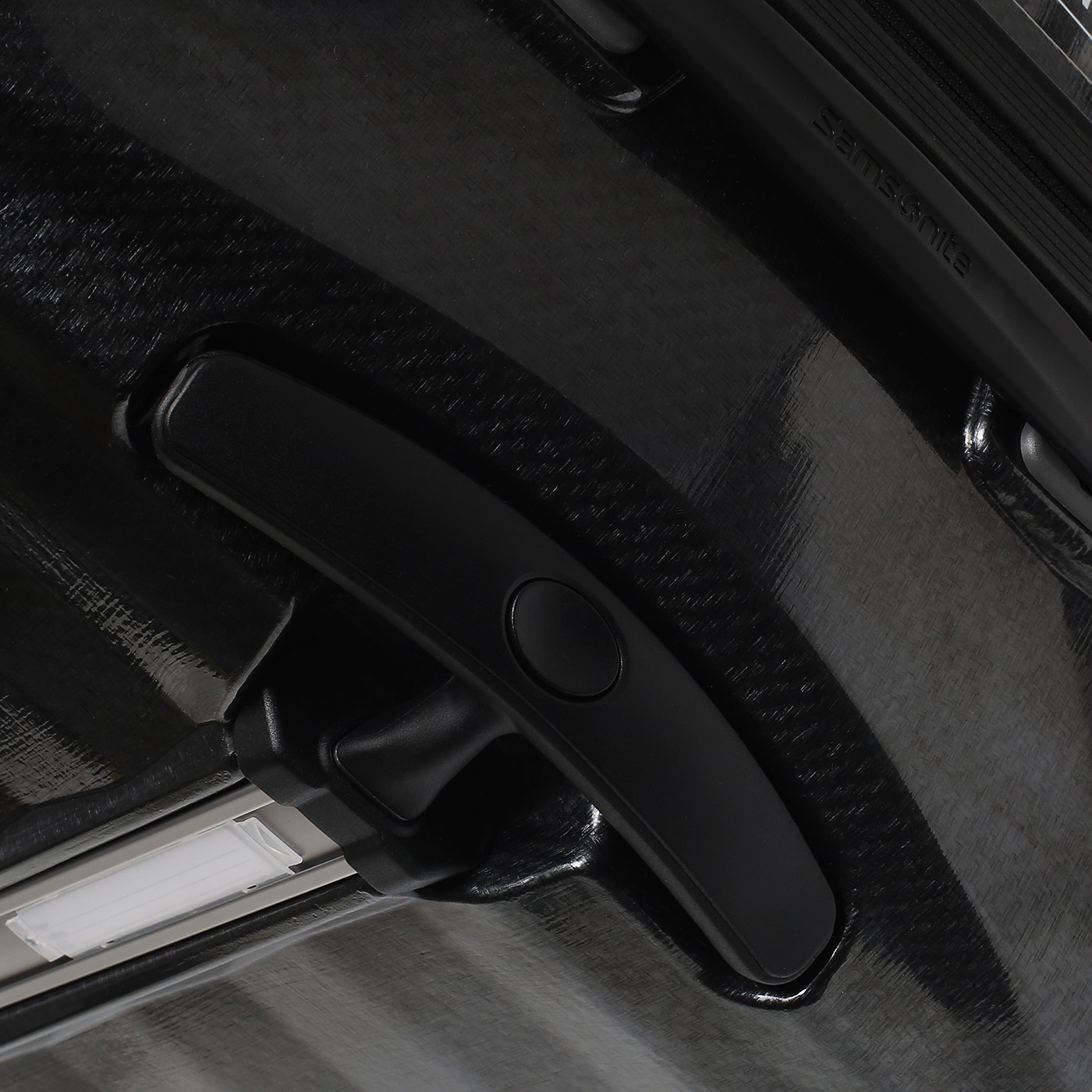 Большой чемодан из легкого пластика Samsonite Lite-Shock